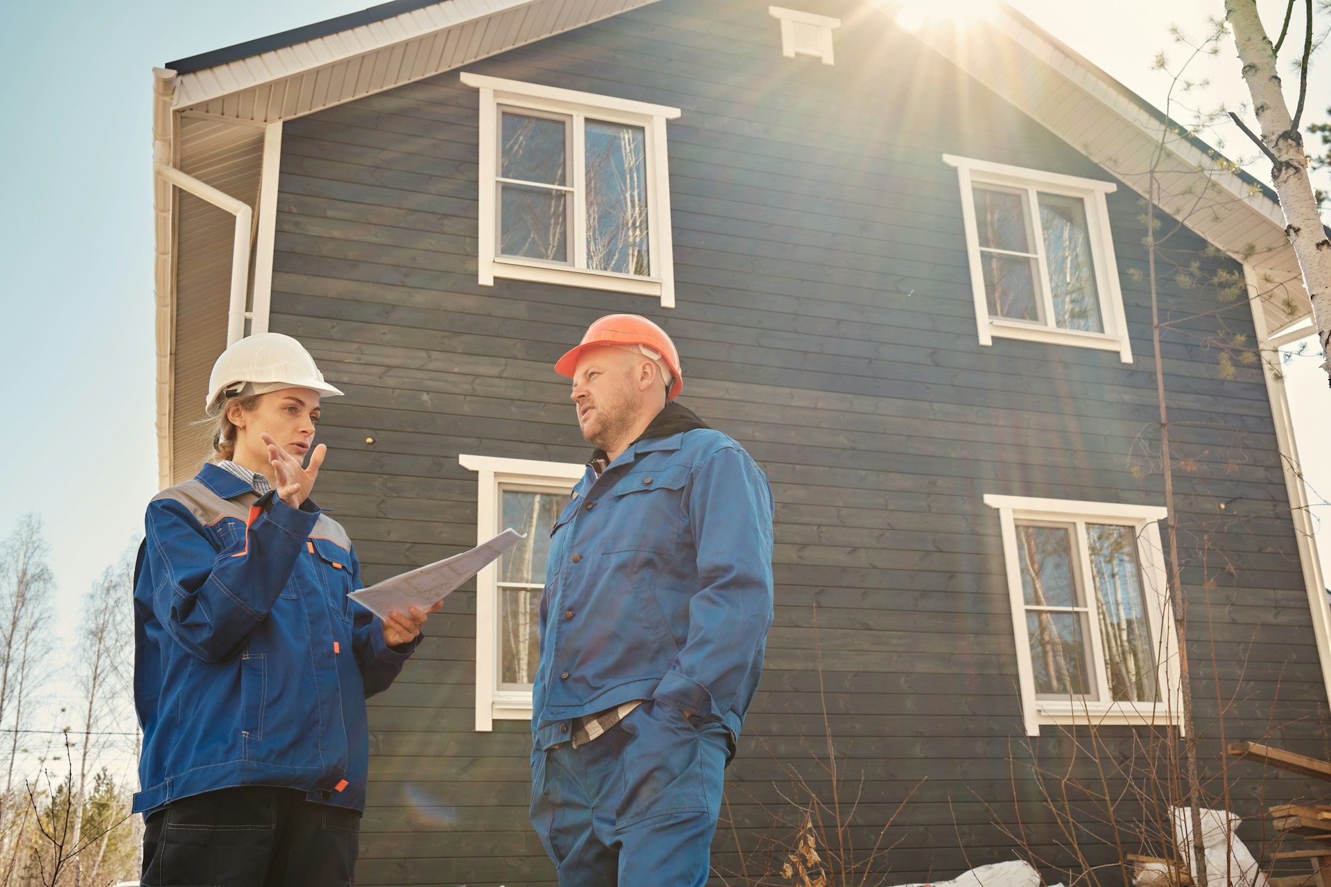 contractors in front of a house